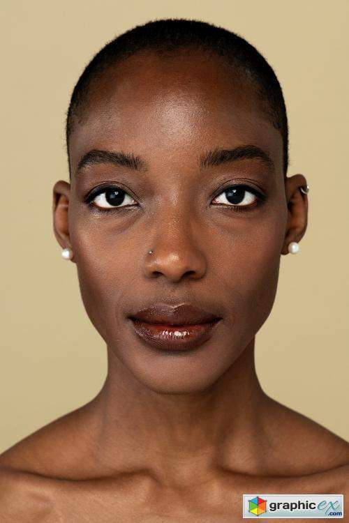 Black woman with a neutral facial expression
